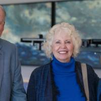 Tom and Marcia Haas with Donna Brooks, smiling at camera
